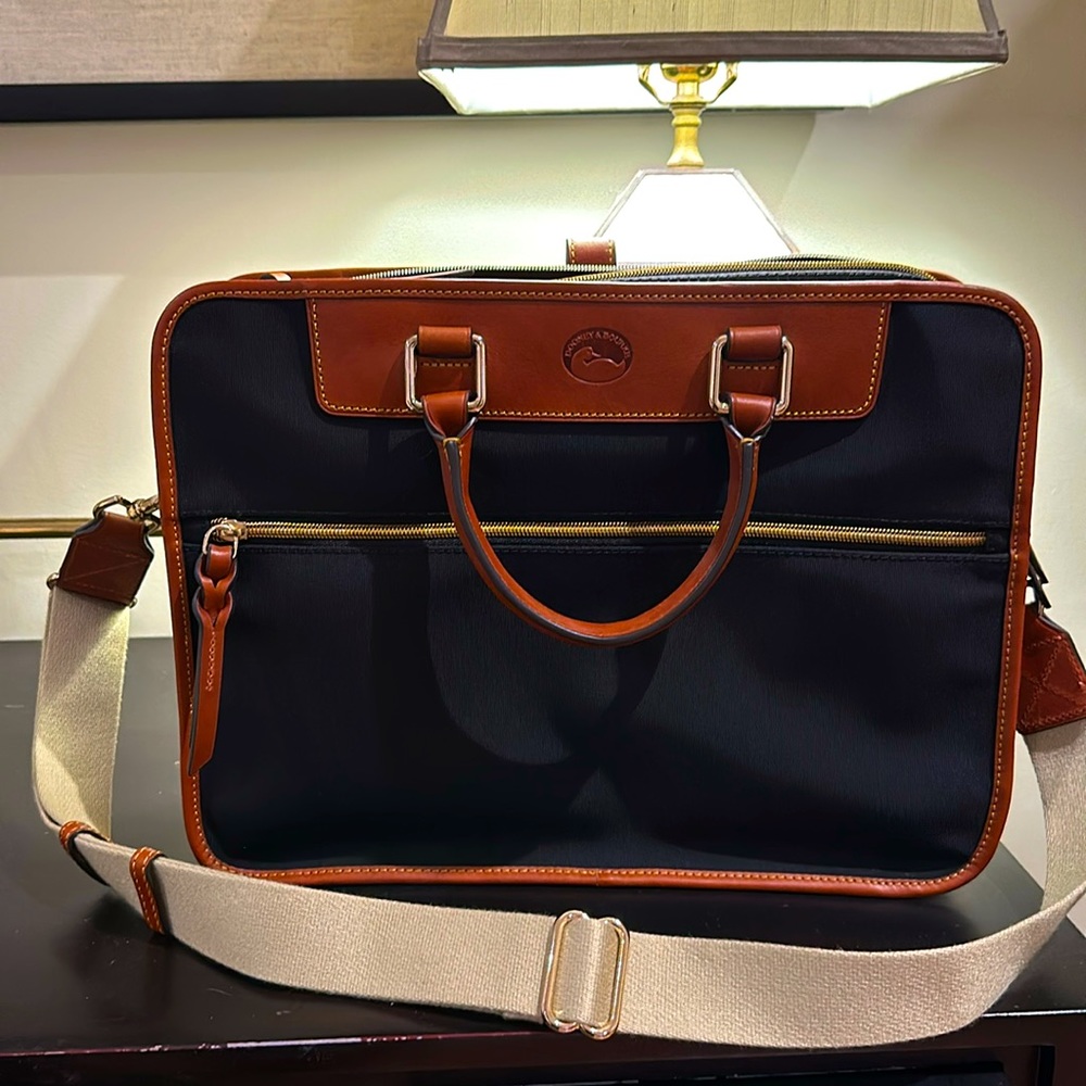 Dooney & Bourke black & tan briefcase. NEW!!! well made. Excellent quality!